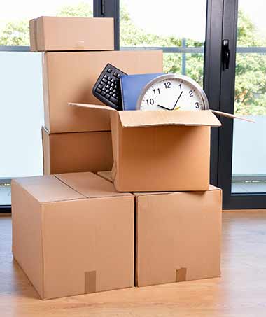 Downsizing boxes ready to move