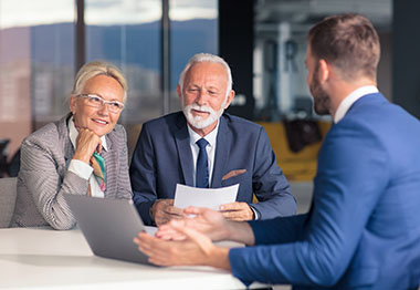 Retired couple meeting with advisor