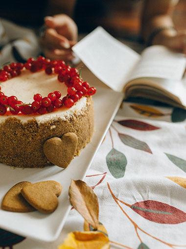 fruit topped cake and cookies