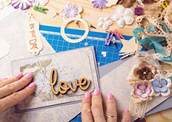Woman's hand scrapbooking