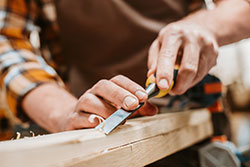 Man working with wood