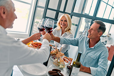 Retirees enjoying dining out at a restaurant