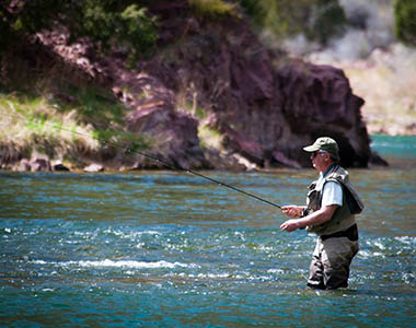 Man fishing on a river