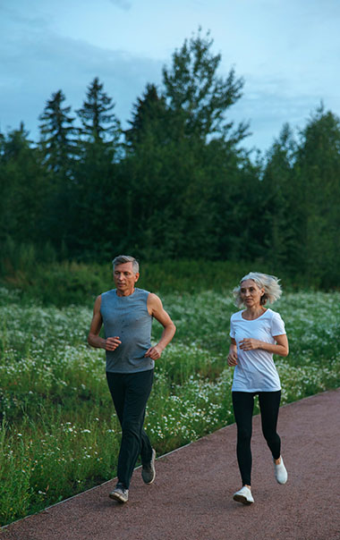 Retired couple jogging