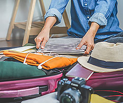 woman packing  luggage
