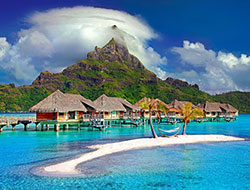 Huts over water in Bora Bora
