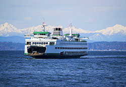 Ferry with Hurricane Ridge mountains in background
