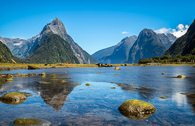 Beautiful view of Milford Sound and towering mountains in New Zealand